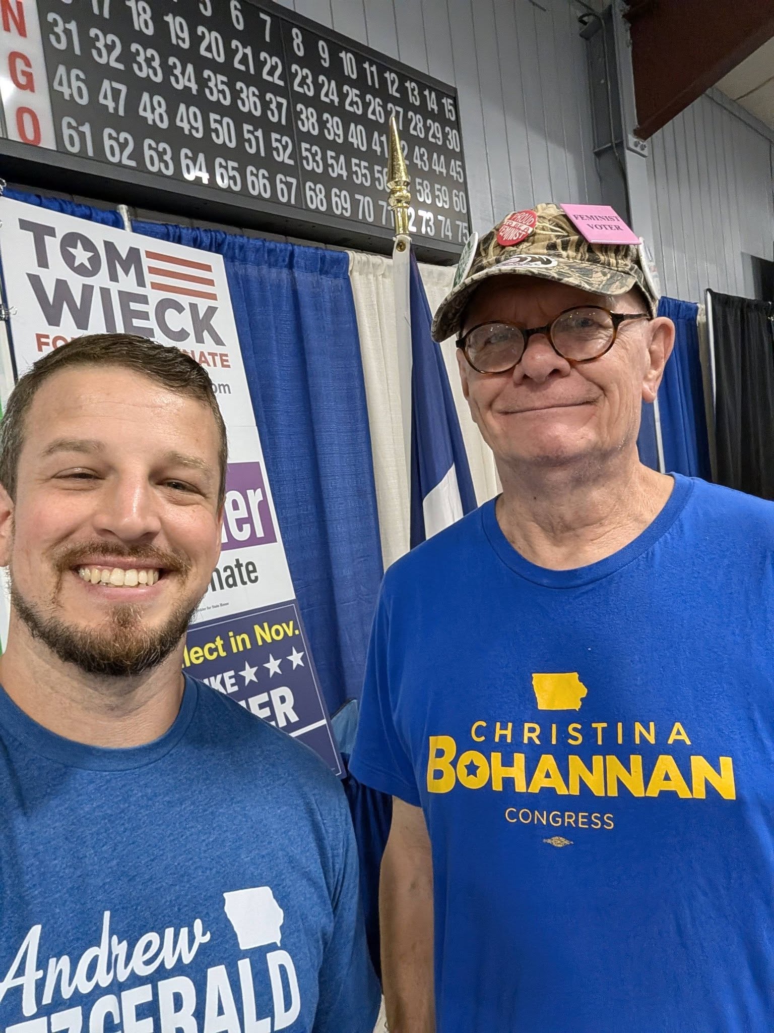 Andrew Fitzgerald with a supporter at a Democratic booth
